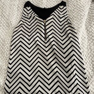 Express Black and White Chevron Zip-Front Sleeveless top